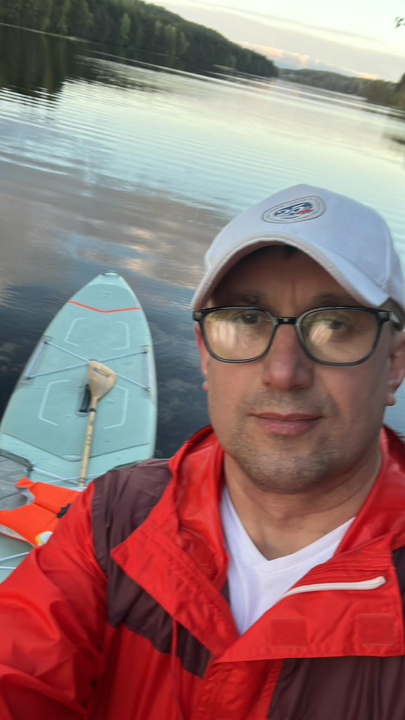 Image of Volodymyr standing near the lake